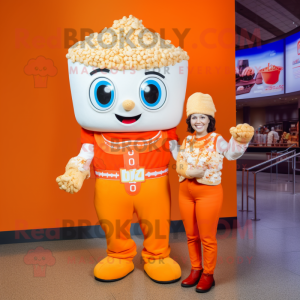 Orange Pop Corn mascot costume character dressed with a Mom Jeans and Rings