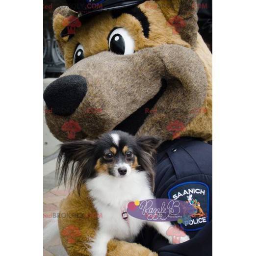 Brun hundemaskot klædt som en politimand - Redbrokoly.com