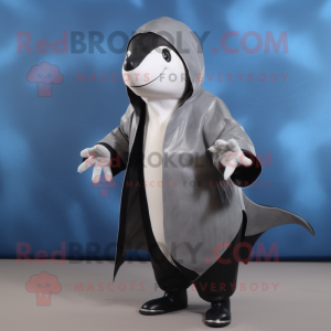 Silver Killer Whale mascot costume character dressed with a Coat and Wraps