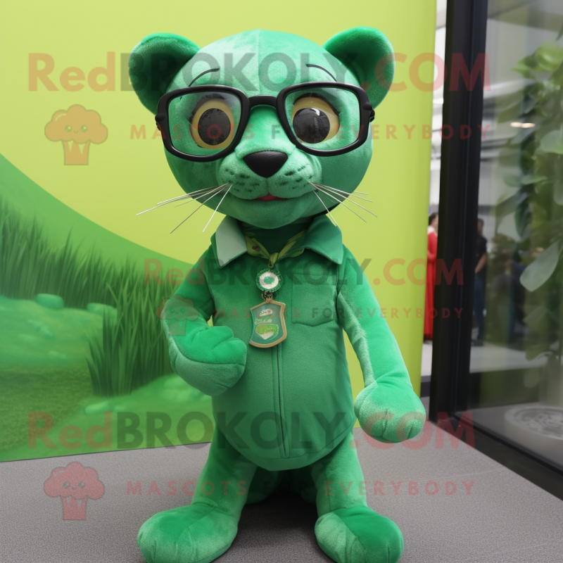 Green Jaguarundi mascot costume character dressed with a Blouse and Eyeglasses Green Jaguarundi mascot costume character dressed with a Blouse and Eyeglasses