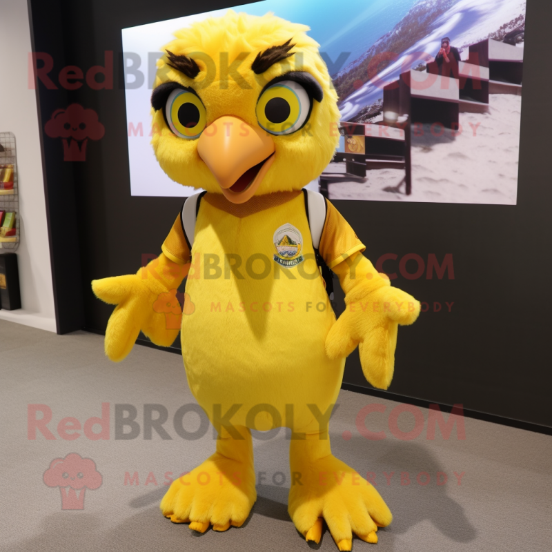 Yellow Falcon mascot costume character dressed with a Shorts and Hair clips