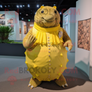 Yellow Glyptodon mascot costume character dressed with a Dress Shirt and Bracelets