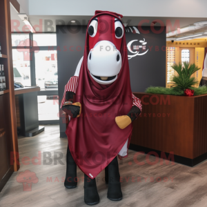 Maroon Horseshoe mascot costume character dressed with a Trousers and Scarf clips