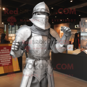 Silver Medieval Knight mascot costume character dressed with a T-Shirt and Caps