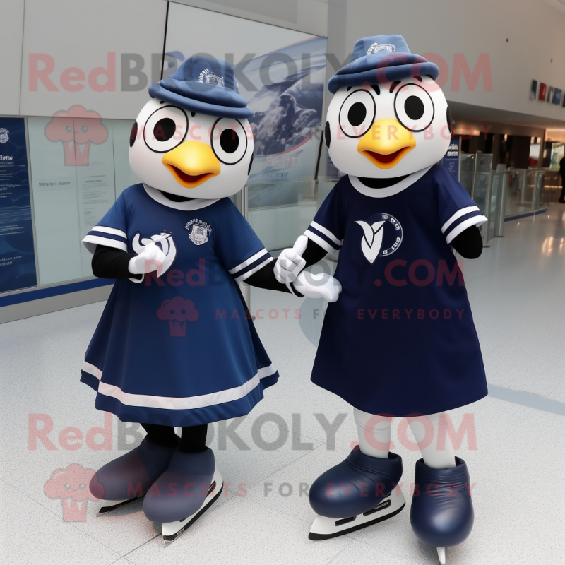 Navy Pair Of Ice Skates mascot costume character dressed with a Midi Dress and Rings Navy Pair Of Ice Skates mascot costume character dressed with a Midi Dress and Rings