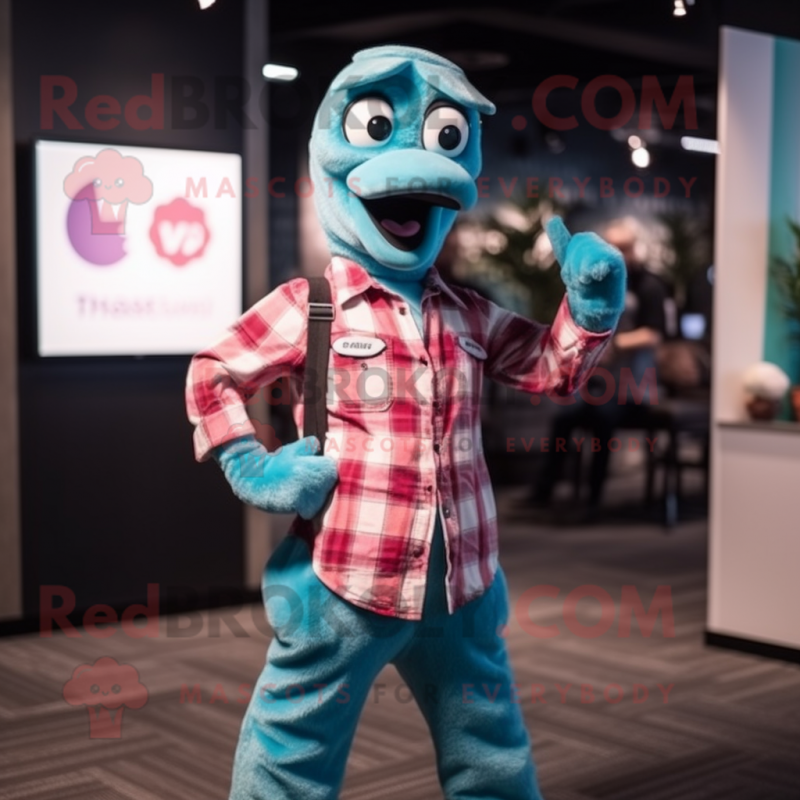 Turquoise Flamingo mascot costume character dressed with a Flannel Shirt and Smartwatches Turquoise Flamingo mascot costume character dressed with a Flannel Shirt and Smartwatches