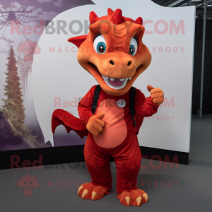 Red Dragon mascot costume character dressed with a Romper and Backpacks