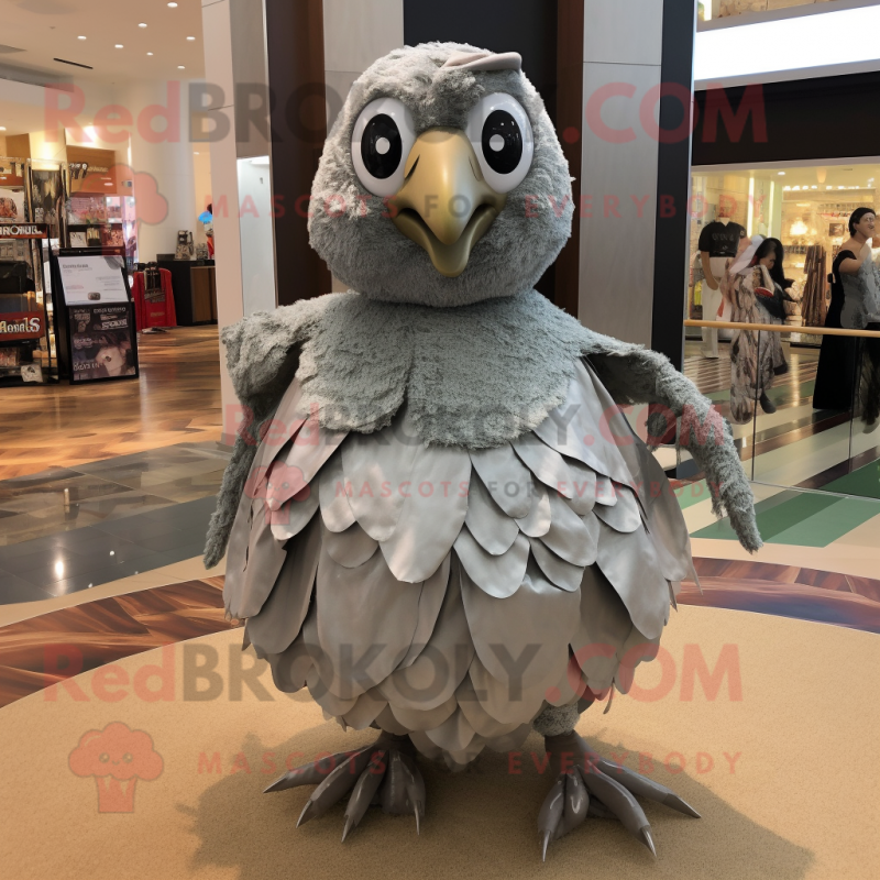 Silver Quail mascot costume character dressed with a Pleated Skirt and Hair clips