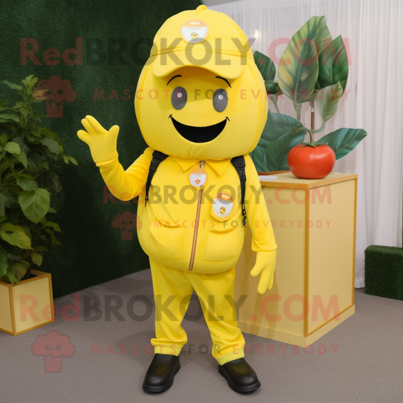 Lemon Yellow Tomato mascot costume character dressed with a Cargo Pants and Brooches Lemon Yellow Tomato mascot costume character dressed with a Cargo Pants and Brooches