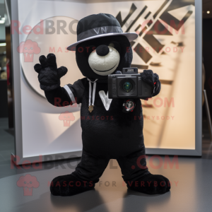 Black Camera mascot costume character dressed with a V-Neck Tee and Caps