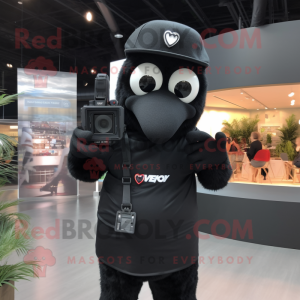 Black Camera mascot costume character dressed with a V-Neck Tee and Caps