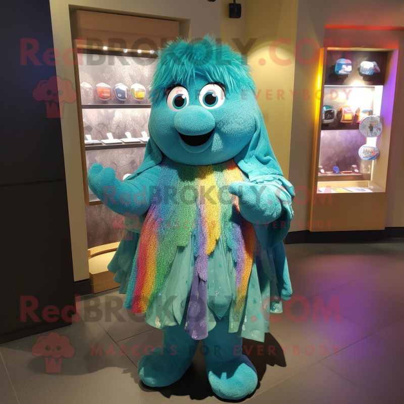 Turquoise Rainbow mascot costume character dressed with a Wrap Dress and Brooches Turquoise Rainbow mascot costume character dressed with a Wrap Dress and Brooches