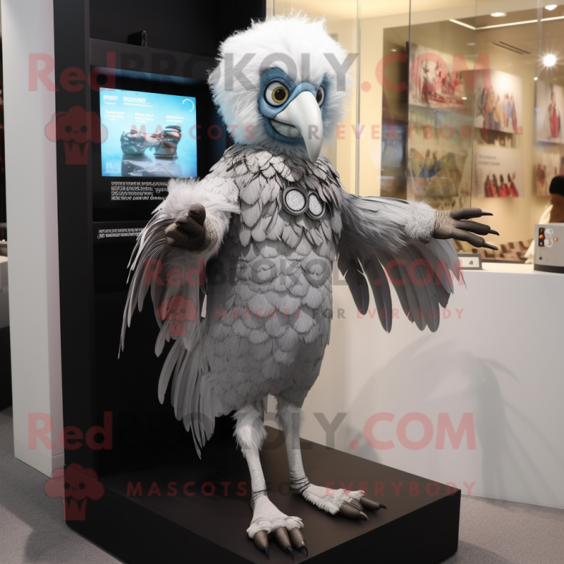 Silver Harpy mascot costume character dressed with a Mini Skirt and Digital watches