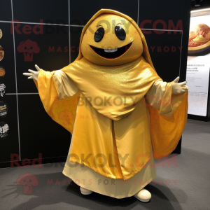 Gold Sushi mascot costume character dressed with a Culottes and Shawl pins