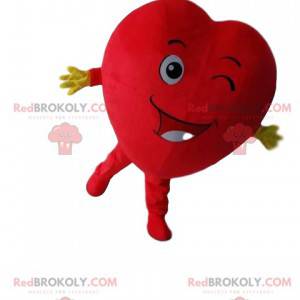 Mascota gigante del corazón rojo, guiñando un ojo -