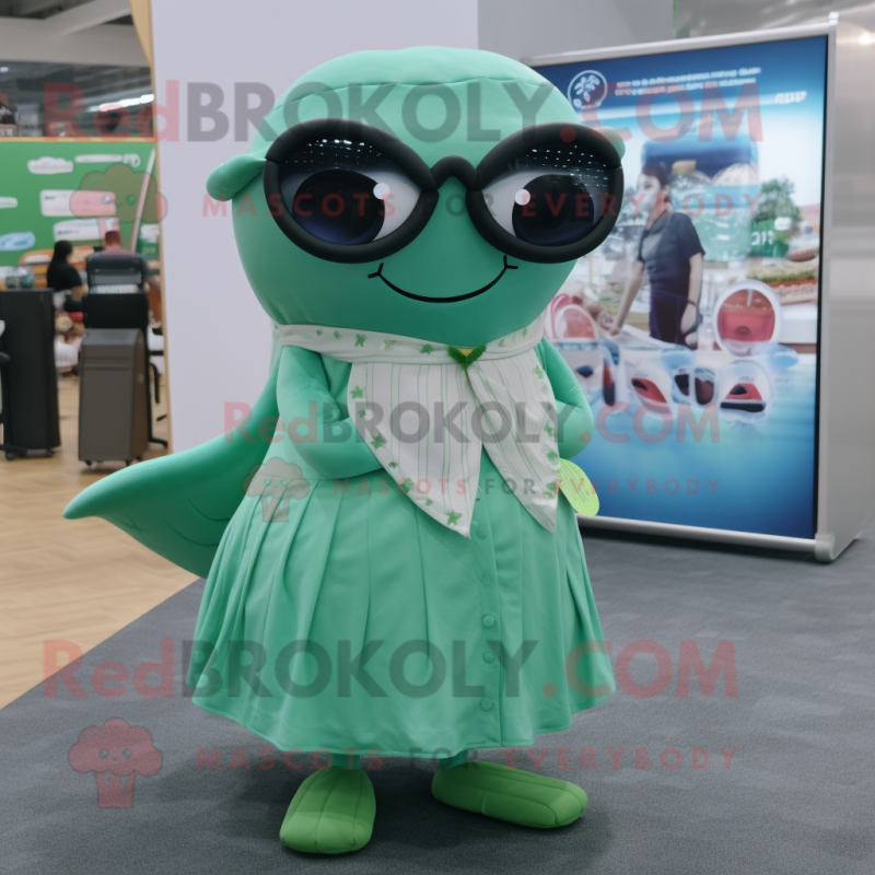 Green Humpback Whale mascot costume character dressed with a Skirt and Eyeglasses Green Humpback Whale mascot costume character dressed with a Skirt and Eyeglasses