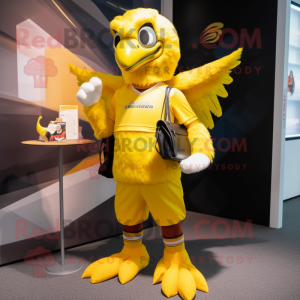 Yellow Eagle mascot costume character dressed with a Running Shorts and Wallets