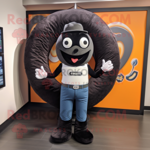 Black Donut mascot costume character dressed with a Bootcut Jeans and Scarves