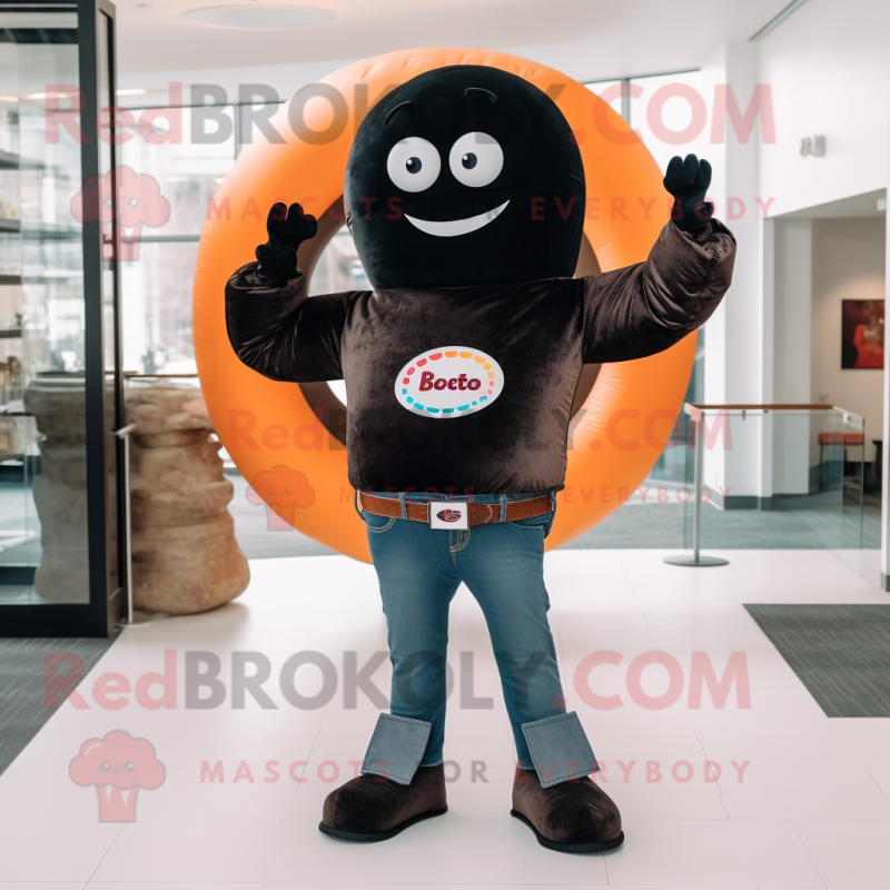 Black Donut mascot costume character dressed with a Bootcut Jeans and Scarves