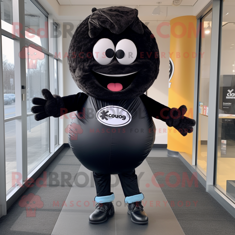 Black Donut mascot costume character dressed with a Bootcut Jeans and Scarves Black Donut mascot costume character dressed with a Bootcut Jeans and Scarves
