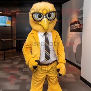 Yellow Bald Eagle mascot costume character dressed with a Suit Jacket and Eyeglasses