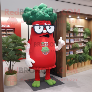 Red Broccoli mascot costume character dressed with a Graphic Tee and Reading glasses