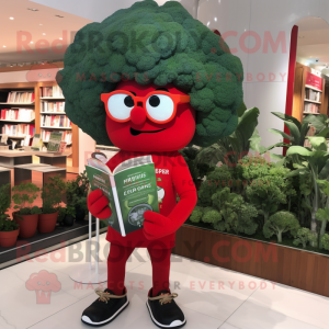 Red Broccoli mascot costume character dressed with a Graphic Tee and Reading glasses