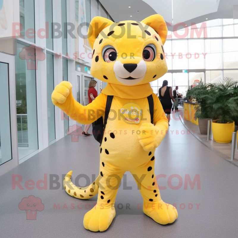 Lemon Yellow Cheetah mascot costume character dressed with a Flare Jeans and Backpacks Lemon Yellow Cheetah mascot costume character dressed with a Flare Jeans and Backpacks