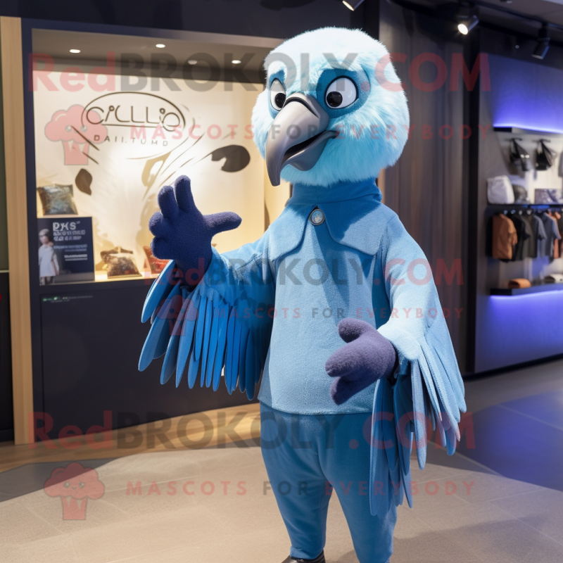 Sky Blue Vulture mascot costume character dressed with a Polo Tee and Mittens Sky Blue Vulture mascot costume character dressed with a Polo Tee and Mittens
