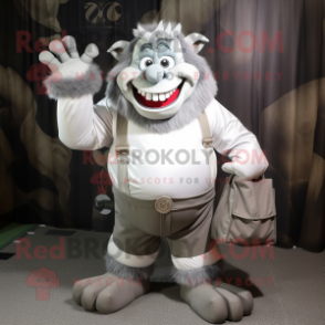 Silver Ogre mascot costume character dressed with a Cargo Shorts and Clutch bags
