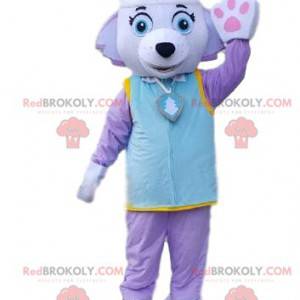 Hondenmascotte in paarse outfit. Kleurrijk teefkostuum -