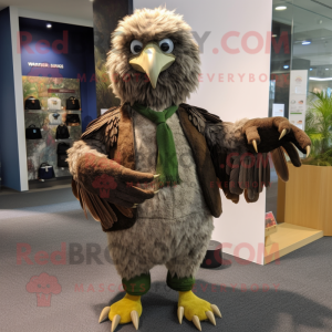 Olive Haast'S Eagle mascot costume character dressed with a Cardigan and Gloves