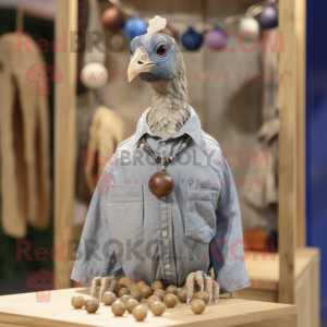 Tan Guinea Fowl mascot costume character dressed with a Chambray Shirt and Necklaces