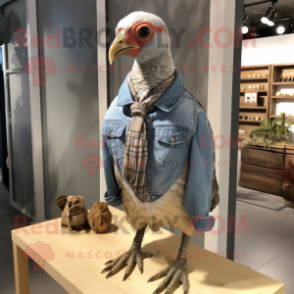 Tan Guinea Fowl mascot costume character dressed with a Chambray Shirt and Necklaces