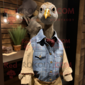 Tan Guinea Fowl mascot costume character dressed with a Chambray Shirt and Necklaces