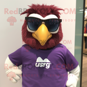 Purple Eagle mascot costume character dressed with a T-Shirt and Eyeglasses