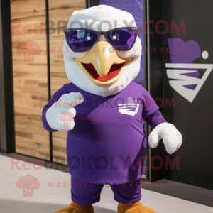 Purple Eagle mascot costume character dressed with a T-Shirt and Eyeglasses