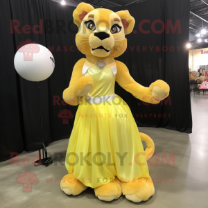 Lemon Yellow Mountain Lion mascot costume character dressed with a Ball Gown and Suspenders