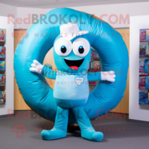 Cyan Donut mascot costume character dressed with a Jeans and Wraps