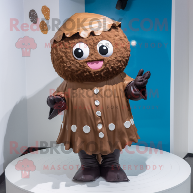 Brown Cupcake mascot costume character dressed with a Raincoat and Rings Brown Cupcake mascot costume character dressed with a Raincoat and Rings