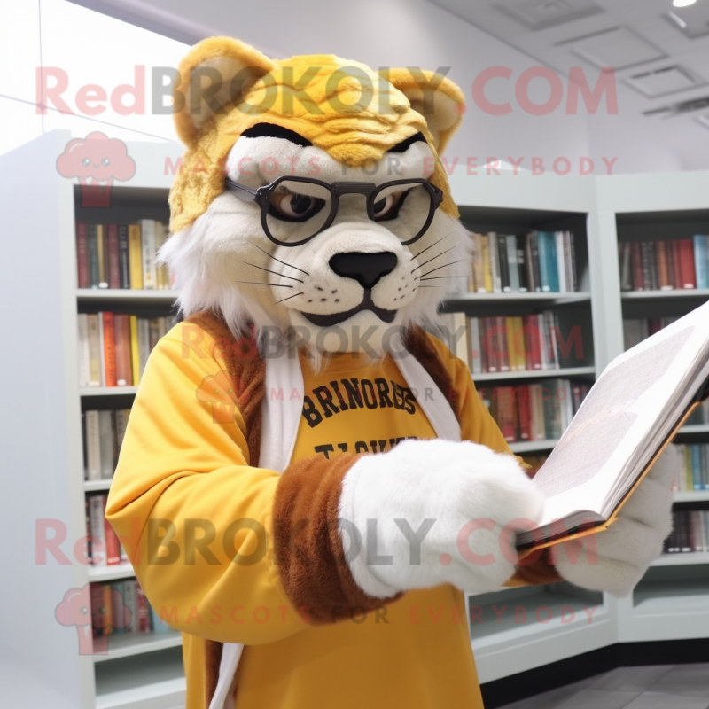 Gold Saber-Toothed Tiger mascot costume character dressed with a Cover-up and Reading glasses