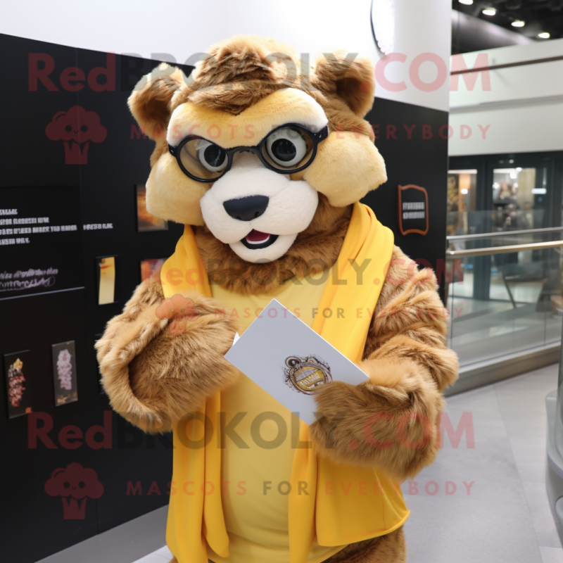 Gold Saber-Toothed Tiger mascot costume character dressed with a Cover-up and Reading glasses Gold Saber-Toothed Tiger mascot costume character dressed with a Cover-up and Reading glasses