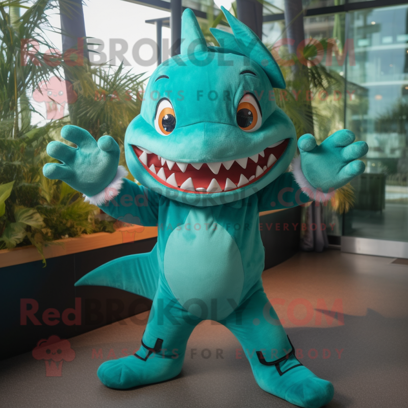 Turquoise Shark mascot costume character dressed with a Blouse and Mittens