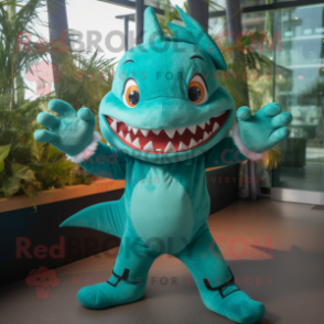 Turquoise Shark mascot costume character dressed with a Blouse and Mittens