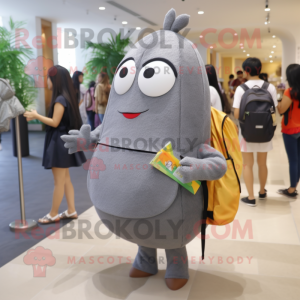 Gray Mango mascot costume character dressed with a A-Line Dress and Backpacks