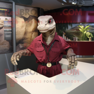 Maroon Anaconda mascot costume character dressed with a Blouse and Cufflinks