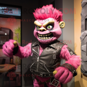 Pink Frankenstein'S Monster mascot costume character dressed with a Moto Jacket and Cufflinks