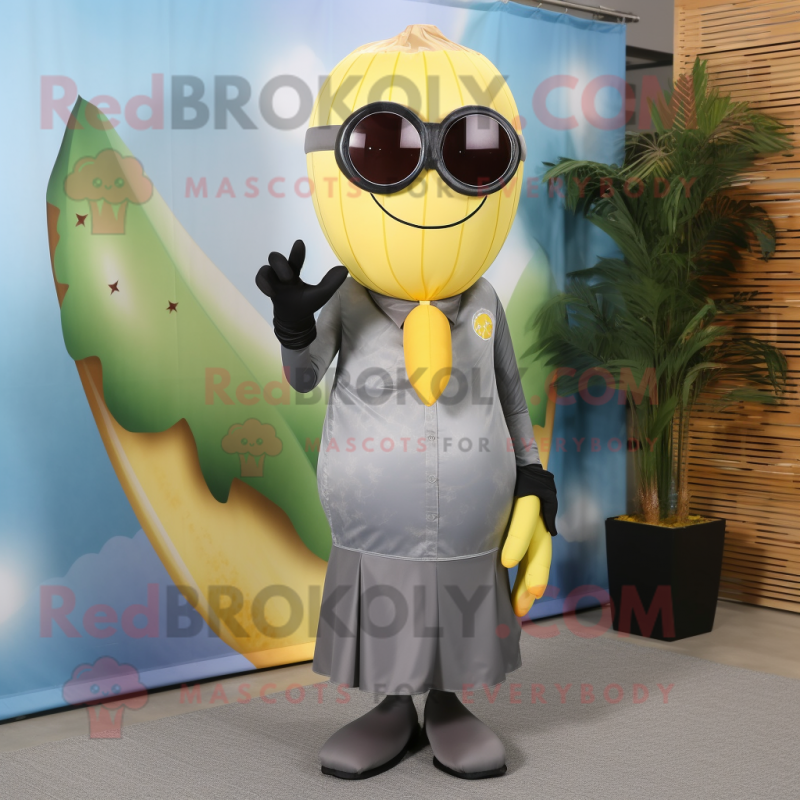 Gray Banana mascot costume character dressed with a A-Line Dress and Sunglasses Gray Banana mascot costume character dressed with a A-Line Dress and Sunglasses