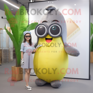 Gray Banana mascot costume character dressed with a A-Line Dress and Sunglasses