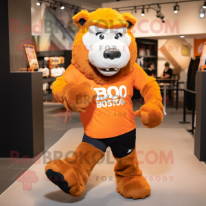 Orange Bison mascot costume character dressed with a Running Shorts and Smartwatches